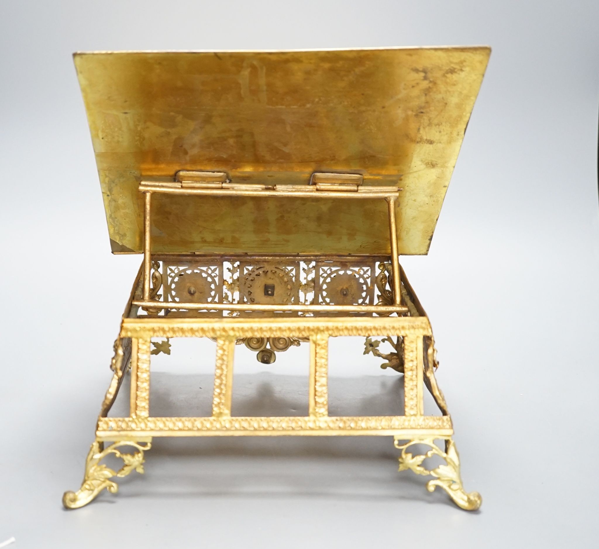 A 19th century gilt brass bible stand